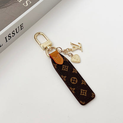 Luxury Leather Keychain Charm with Gold Accents
